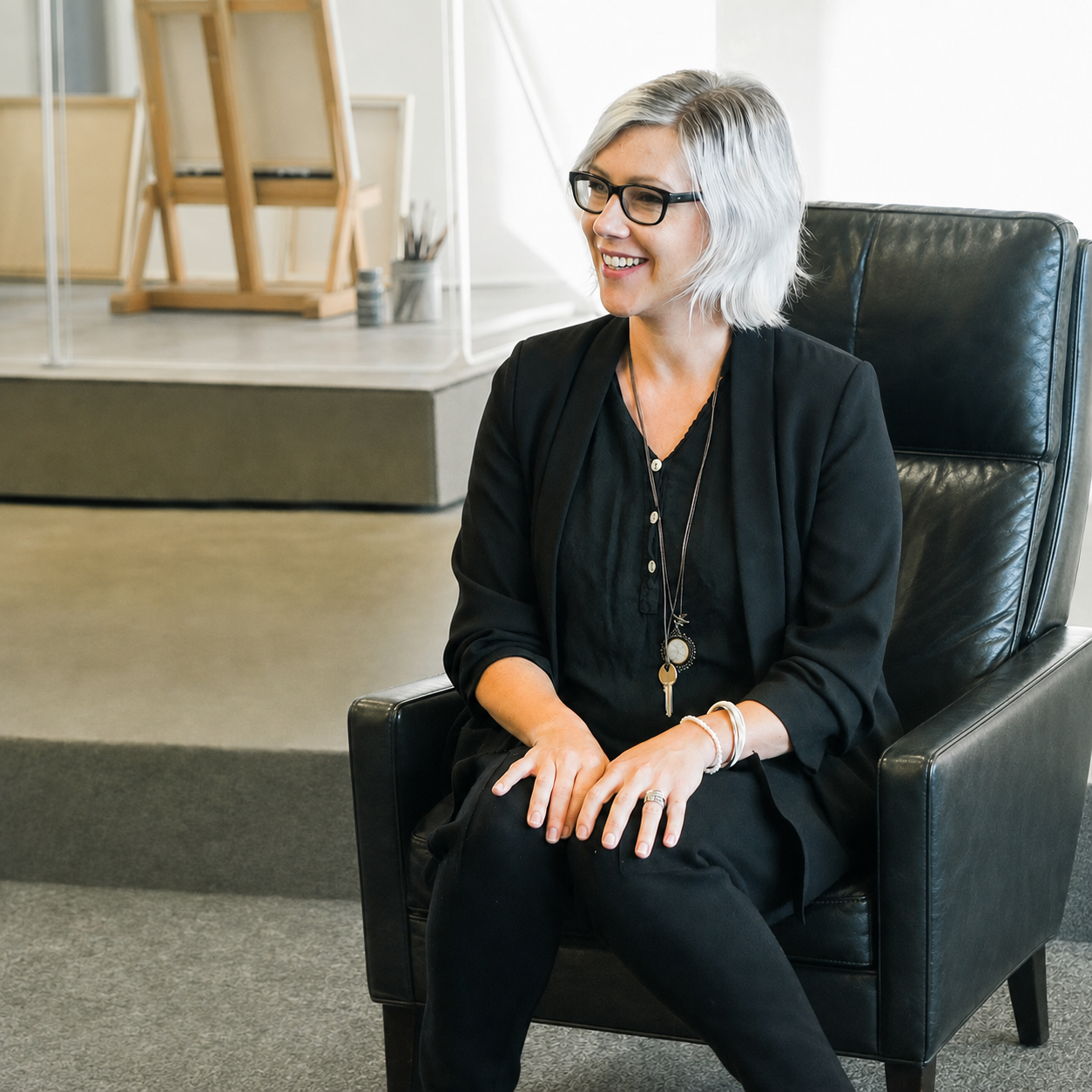 Ruth Truttmann seated in her studio